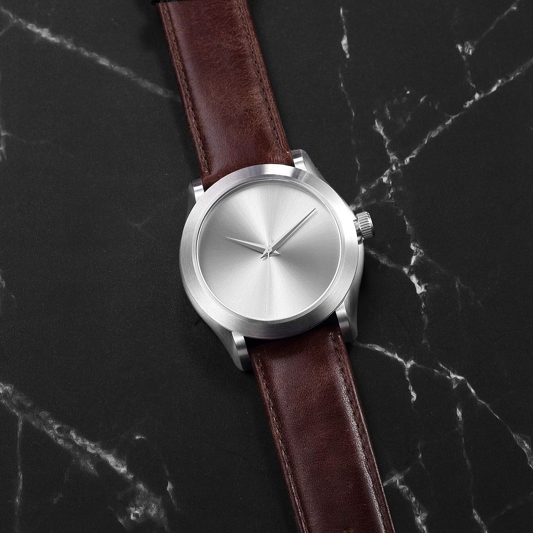 Silver watch with online leather band